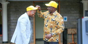 Deputy President William Ruto (right) welcomes MC Jessy to UDA on Wednesday, January 19, 2022.