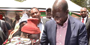 Deputy President William Ruto issues title deeds to a resident of Mosop, Nandi County on March 13, 2020.