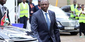 President William Ruto walking past his Lexus LX570.