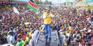 President William Ruto campaigns atop a vehicle in Kakamega County on Sunday, July 31, 2022..jpg