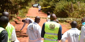 Homicide experts at the second scene, an earth road at Mokombet village on Thursday January 12, 2022, where the body of Edwin Kiprotich Kipruto alis Chiloba was found stuffed in a metallic box.