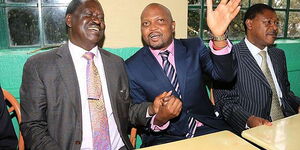 Former Prime Minister Raila Odinga with Gatundu South MP Moses Kuria and Bungoma Senator Moses Wetangula.