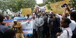 Public university lecturers holding a demonstration in Nairobi during a past strike