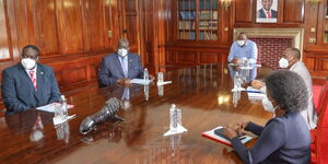 President Uhuru Kenyatta receives the 2020 KCSE results from the education ministry on Monday, May 10