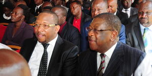 Nairobi governor Mike Sonko(Left) and Busia Senator Amos Wako(Right) during former president Daniel Moi's burial on Wednesday, February 12