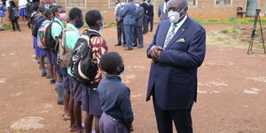 Education CS George Magoha conversing with 2020 KCPE Candidates.