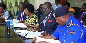 Education Cabinet Secretary George Magoha (second from right) and Inspector General of Police Hillary Mutyambai pictured at the special seating held by the National Assembly's Committee on Education on February 26.