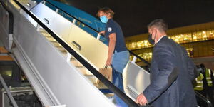 Estonia President Kersti Kaljulaid boarding a commercial plane at JKIA