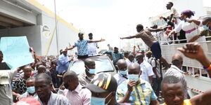 Mombasa Governor Ali Hassan Joho and ODM Party leader Raila Odinga addressing a crowd in Nyali, Mombasa County on Thursday, March 4.