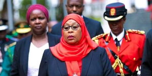 Tanzania's President Samia Suluhu in the company of her bodyguards 