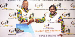 Expeditions Safaris CEO Pancras Karema (left) and the dancing nurse Lokresia Karema after signing deal on Thursday, November 10, 2022.