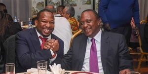 Nairobi Governor Mike Sonko (left) with President Uhuru Kenyatta at an event in 2017