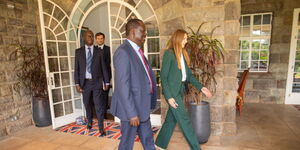 ODM party leader Raila Odinga (left) walking alongside the British High Commissioner to Kenya, Jane  Marriott.