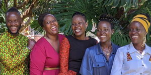 Lupita Nyong'o poses for a photo with her siblings on April 10, 2022. 