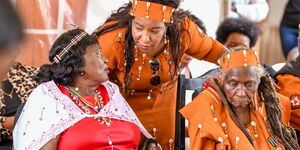Chair of Women League Hon Agnes Kagure speaking to former first lady Mama Ngina Kenyatta on Saturday, April 2. 