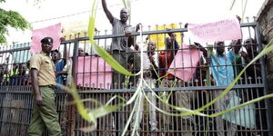 Farmers pictured protesting the directive by NEMA outside the closed Kibos Sugar and Allied Industries Limited in Kisumu County on March 9, 2020. 