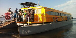 Passengers disembarking from a ferry on Lake Victoria.