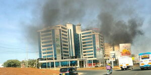 Smoke coming from a dumpsite fire near Airtel Building at Mombasa Road on March 3, 2023.