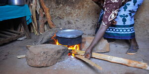 A photo of Kenyan cooking using firewood