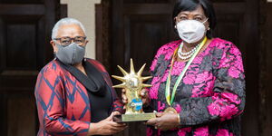 First Lady Margaret Kenyatta (left) and former First Lady Mama Ngina Kenyatta during a prize handover ceremony.