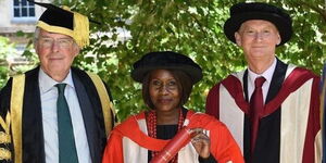 Former CS Judi Wakhungu posing with her Honorary Degree of Doctor of Science