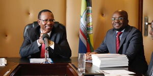 Former Interior PS Karanja Kibicho and PS Raymond Omollo during a hand over ceremony at Harambee House on Monday, December 5, 2022