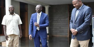 Former Mumias Mayor Ronald Kongoti (left), DP William Ruto (Center) and former CS Rashid Echesa.