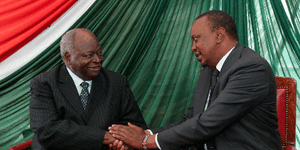 Former President Mwai Kibaki greets his successor Uhuru Kenyatta.