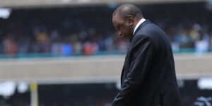Former President Uhuru Kenyatta walks down the dias after conducting his last inspection of a guard of honor at the Kasarai Stadium on Tuesday, September 13.