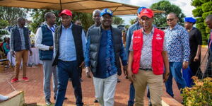 Former Prime Minister Raila Odinga (center) and his allies at an event in Murang'a on Tuesday, May 3, 2022.