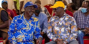 Former Prime Minister Raila Odinga (left) and Meru Governor Kiraitu Murungi at Maua Stadium on Thursday, March 10, 2022.
