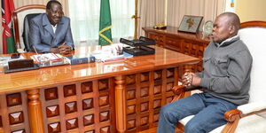Former Prime Minister Raila Odinga (left) speaks to Robert Njura at his Capitol Hill office in Nairobi on Thursday, August 27, 2020.