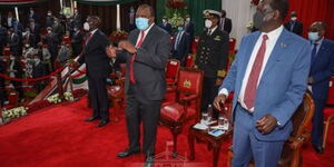 Former Prime Minister Raila Odinga (right), President Uhuru Kenyatta (center) and Deputy President William Ruto at Bomas of Kenya on Monday, October 26, 2020.