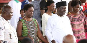Former Prime Minister Raila Odinga (second right) and his daughter Rosemary (second left) attend a church function.