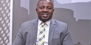 Citizen TV anchor Francis Gachuri in the studio during a live broadcast in 2019.