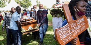 Friends and family of the late K24 Correspondent George Kori carrying his coffin as he was laid to rest on Thursday May 27, 2020, at his family home in Molo, Nakuru County.
