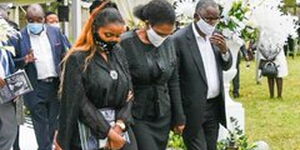 From left Anerlise, Tabitha and James Karanja pictured at the funeral of Tecra Karanja, May 16, 2020.
