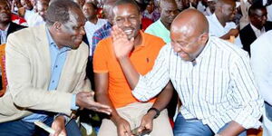 From left: Kakamega Governor Wycliffe Oparanya, ODM Secretary general Edwin Sifuna and Lugari Mp Ayub Savula during burial service in Mumias East on March 24, 2018.