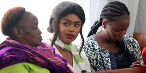 From left, Lucy Ngirita, Anne Ngirita and Phyllis Ngirita at a Milimani law court in 2018