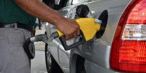 File image of a fuel attendant at work at a petrol station.