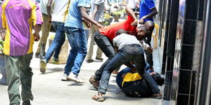 Gang members pictured while committing a crime in Nairobi's Central Business District.