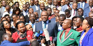 Gatundu South MP Moses Kuria speaking during a press briefing by Ruto-allied MPs on Wednesday, March 11 at parliament.