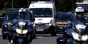 Gendarmes escort a prison van transporting Felicien Kabuga, one of the last key fugitives wanted over the 1994 Rwandan genocide, to the Paris court on May 19, 2020