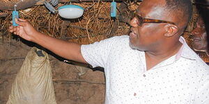 File image of Kilifi Deputy Governor Gideon Saburi inspecting a lighting project at a home in Kilifi County 