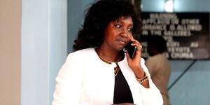 Deputy Speaker of National Assembly Gladys Shollei making a phone call