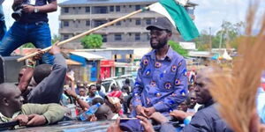 Kisumu Governor Anyang Nyong'o on top of a car during anti-government protests