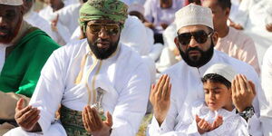 Mombasa Governor Hassan Joho (left) and Mvita MP Abdulswamad Nassir join faithful at Mombasa’s Ronald Ngala Primary School grounds for the Eid ul Fitr celebrations in 2018.