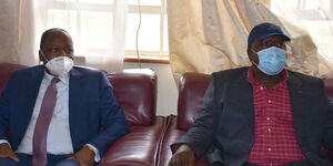 Health Cabinet Secretary Kagwe (Left) and his Interior CS Fred Matiang'i pictured during the meeting with Nyandarua Governor Francis Kimemia on June 15, 2020.
