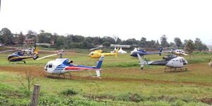 Helicopters belonging to politicians at Dedan Kimathi University during the 2017 Madaraka Day celebrations.