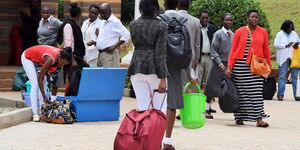 High School students report to school accompanied by their parents in January 2018.